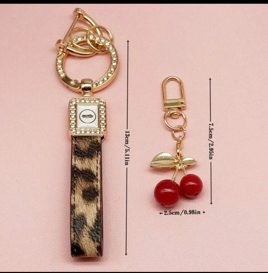 Exquisitely Crafted Leopard Print Leather Car Key Chain With Adorable Cherry Pendant